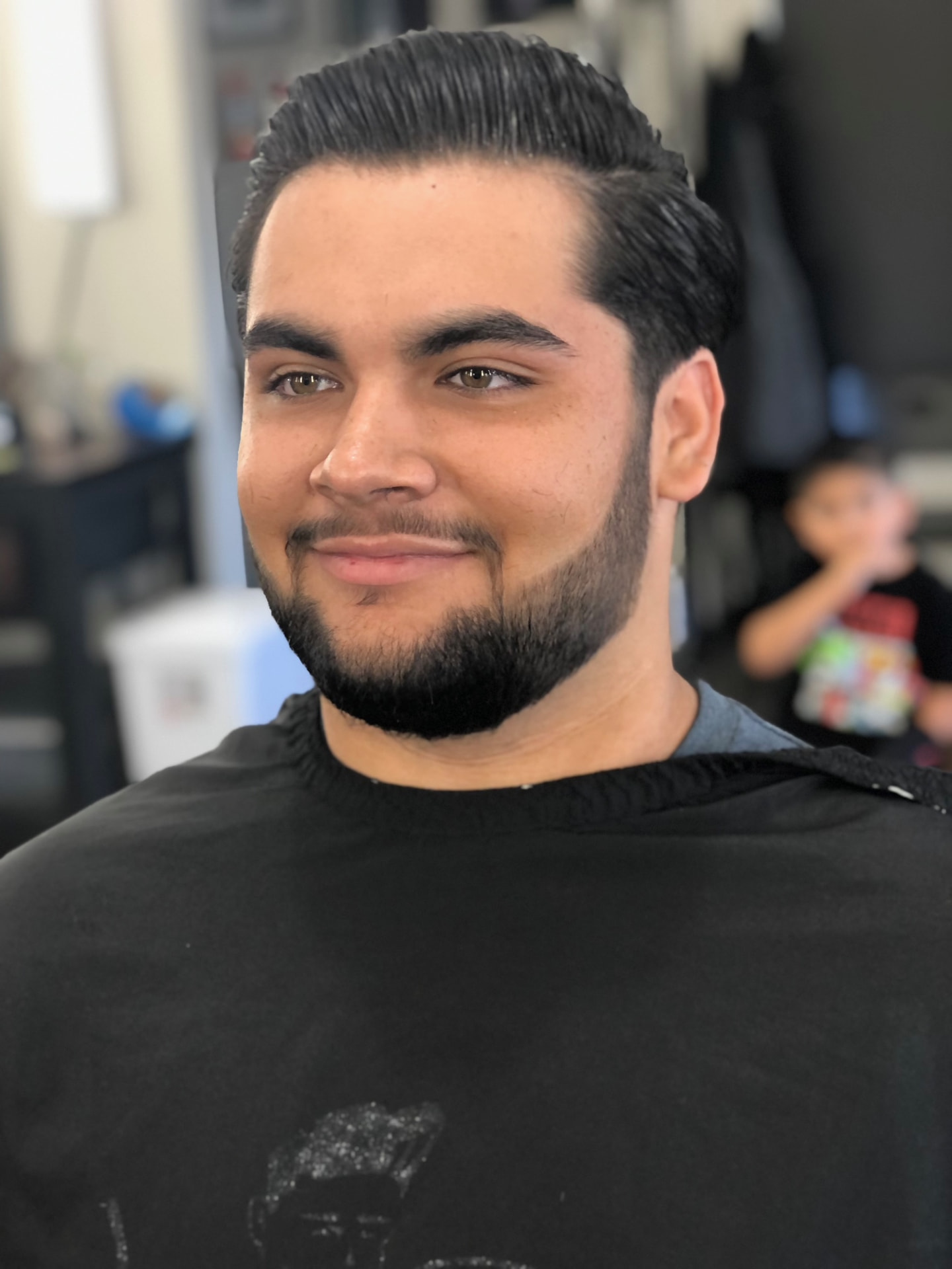 Clean beard lineup and haircut by Ruben