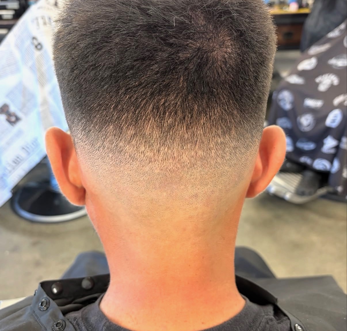 Clean neckline fade by Lauren